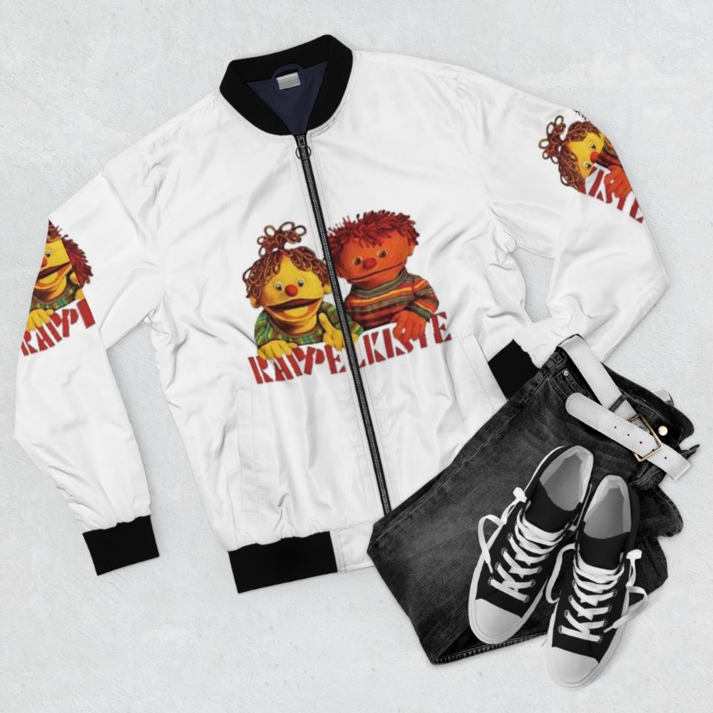 Classic bomber jacket with ratz und rübe Rappelkiste logo and graphic design - Flat lay