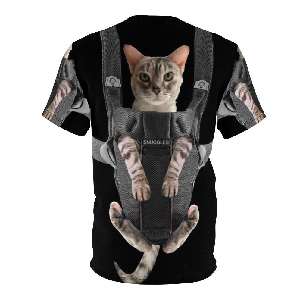 Adorable cat snuggled in a baby carrier on a gray t-shirt - Back