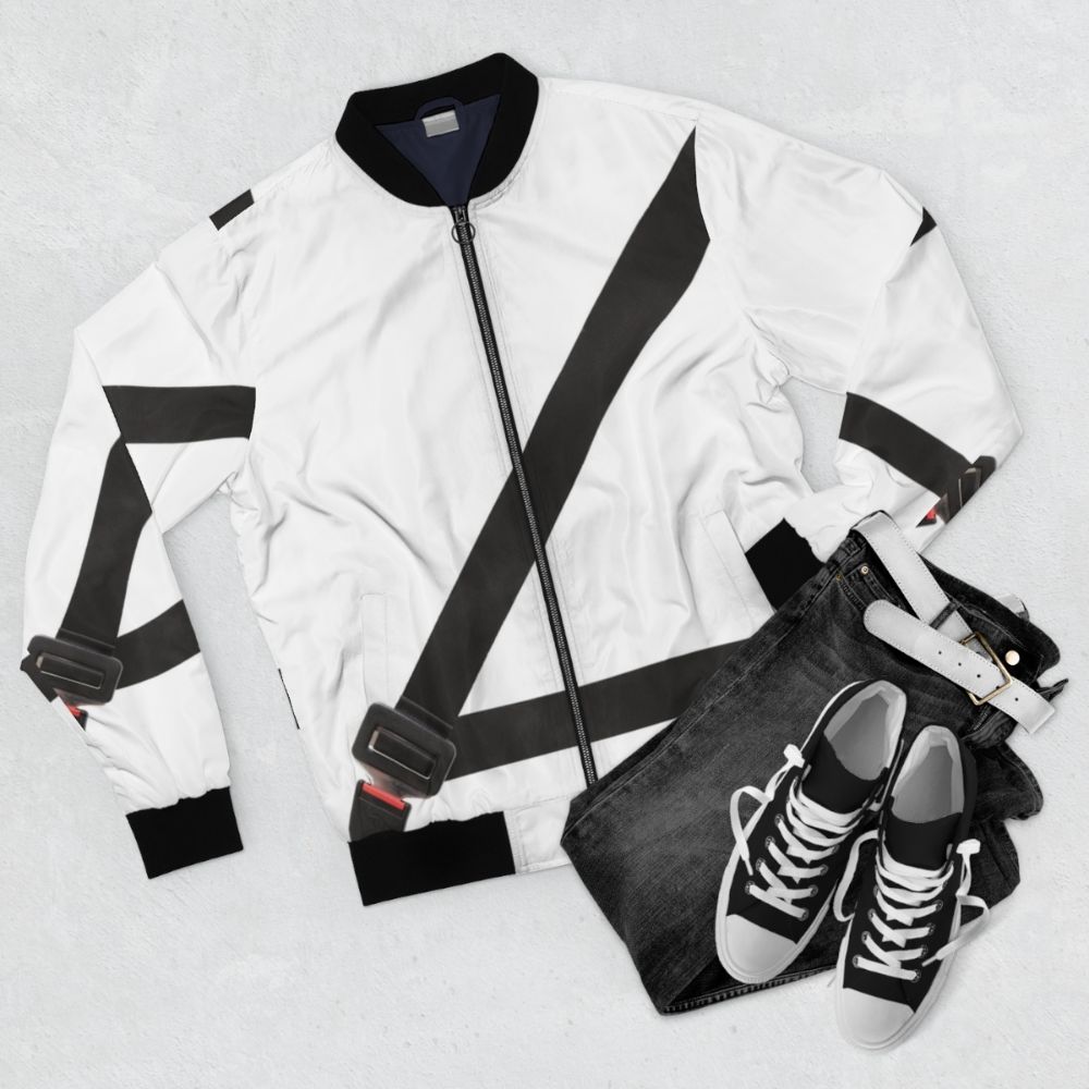 A bomber jacket with a fake seatbelt design, promoting car safety. - Flat lay