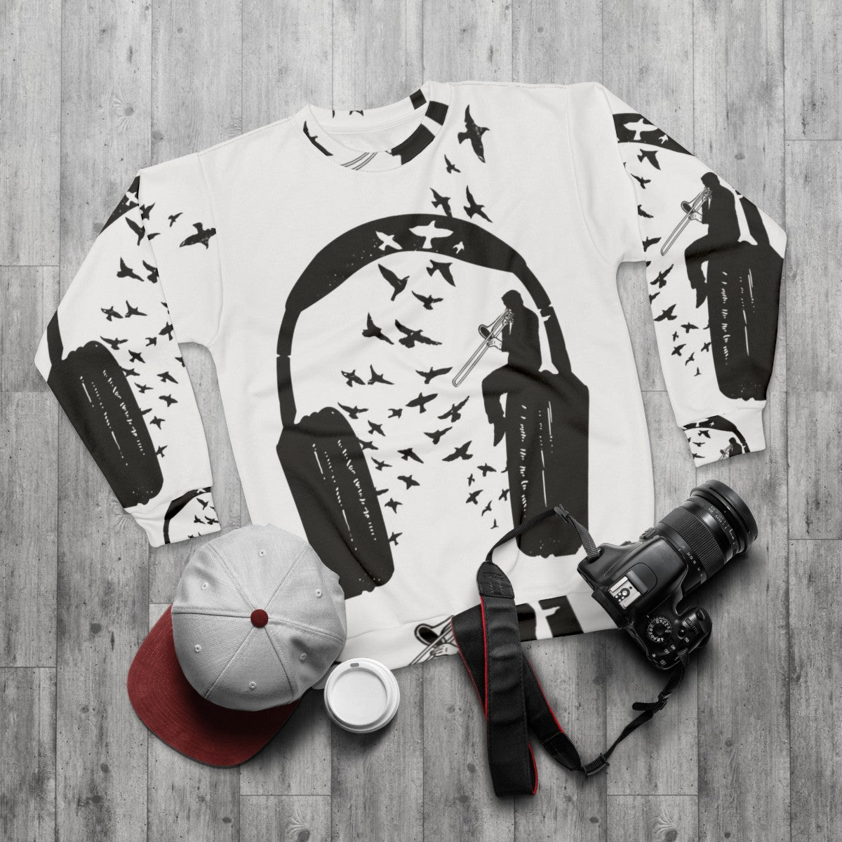 Trombone sweatshirt with headphone design - flat lay