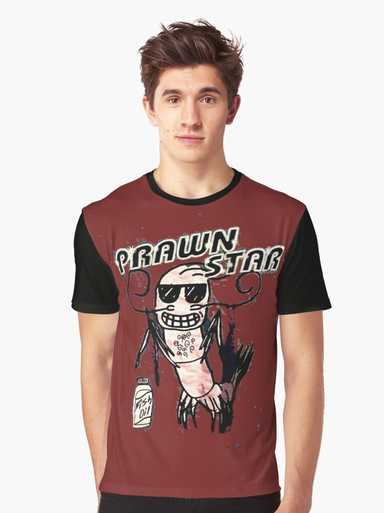 A graphic t-shirt featuring a playful pun design of a "prawn star" character. - Men