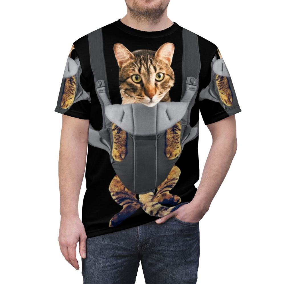 Mockup image of a t-shirt with a cute tabby cat sitting in a baby carrier - men front