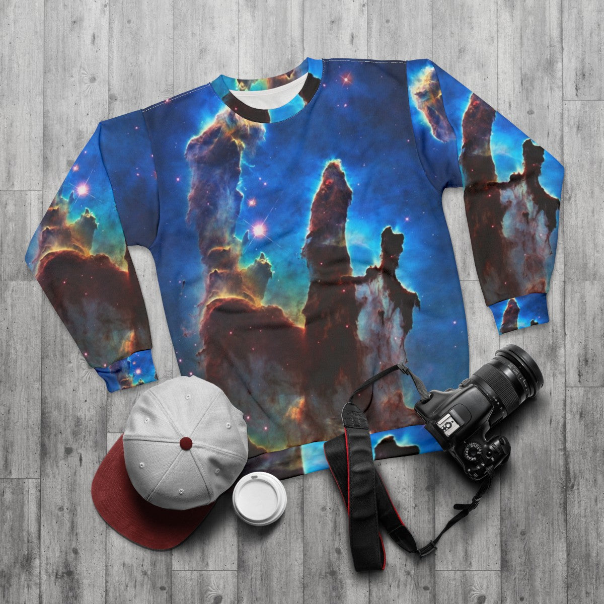 Pillars of Creation astronomy sweatshirt with space and nebula design - flat lay