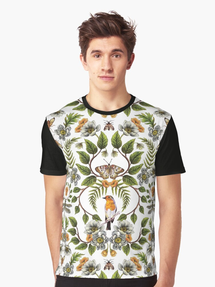 Graphic t-shirt featuring a botanical and floral pattern with birds, moths, dragonflies, and flowers in spring colors of orange, green, and brown. - Men