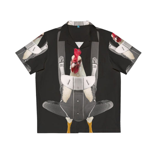 Chicken in baby carrier wearing a Hawaiian shirt