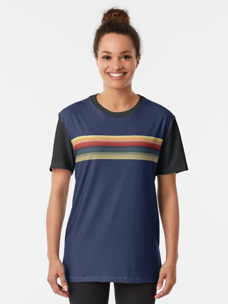 Jodie Whittaker as the 13th Doctor wearing a graphic t-shirt with a rainbow and line pattern - Women