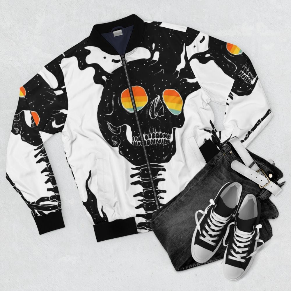 Existential Diffusion Cosmic Bomber Jacket featuring a skull, skeleton, stars, moon, and rainbow in a surreal space design - Flat lay