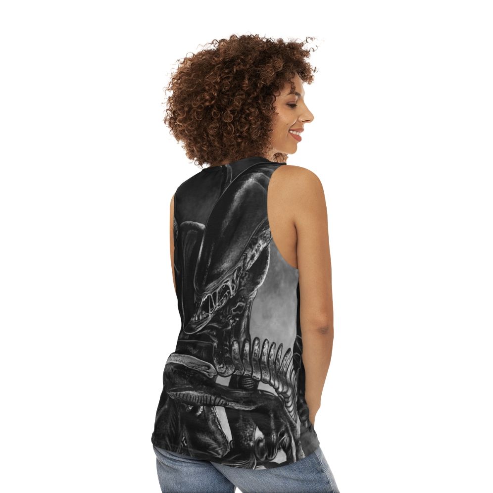 Handdrawn xenomorph alien on a unisex tank top - women back