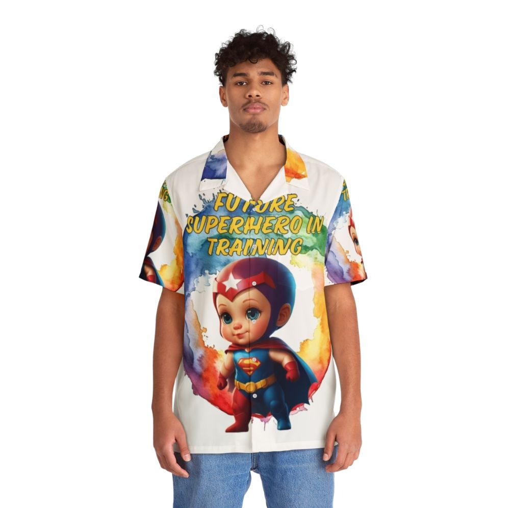 kid wearing blue hawaiian shirt with superhero graphic - People Front