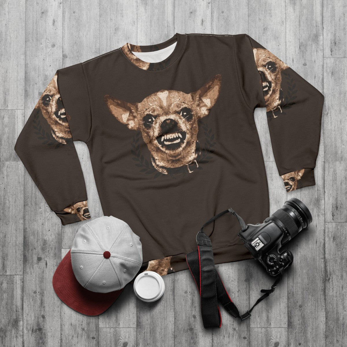 Chihuahua wearing a cozy sweatshirt with a fierce expression - flat lay