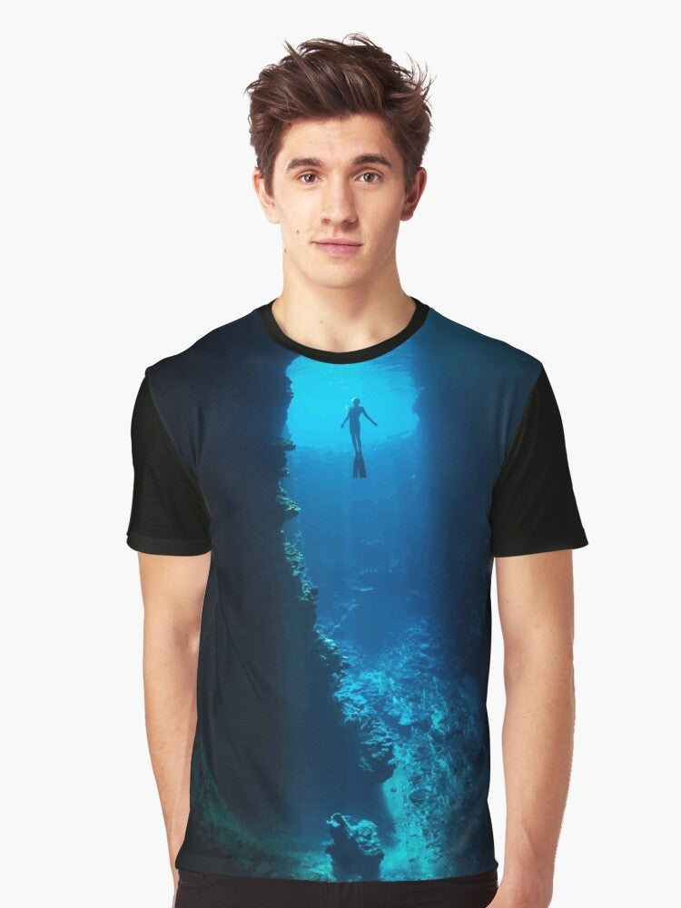 A graphic t-shirt featuring a free diver exploring the ocean - Men