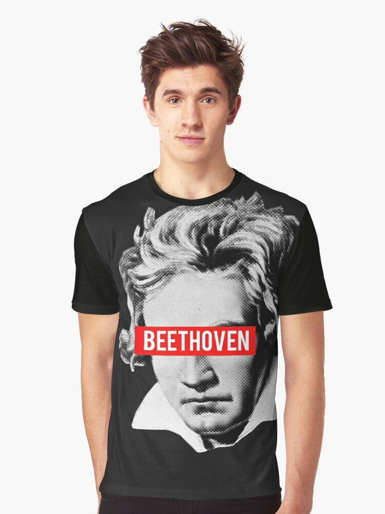 A graphic t-shirt featuring a halftone image of Beethoven, the famous classical music composer, surrounded by musical instruments like violin, viola, cello, and bass. - Men