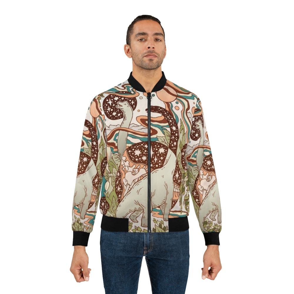 Retro bomber jacket featuring a psychedelic dinosaur sci-fi design in a rainbow palette. - Lifestyle