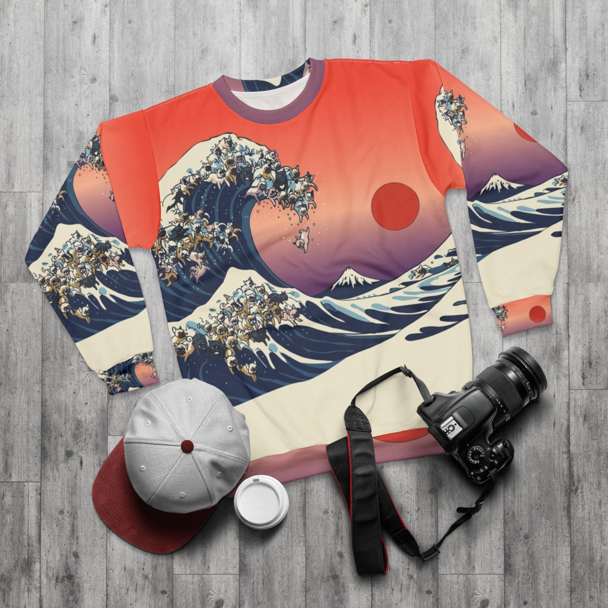 French bulldog wearing sweatshirt with Hokusai's great wave design - flat lay