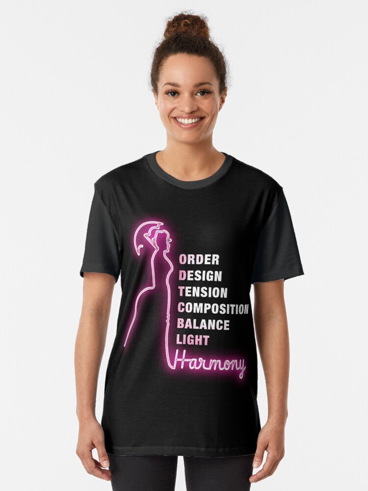 Graphic t-shirt featuring the elements of graphic design: order, design, tension, composition, balance, light, and harmony, inspired by the musical "Sunday in the Park with George" by Stephen Sondheim. - Women