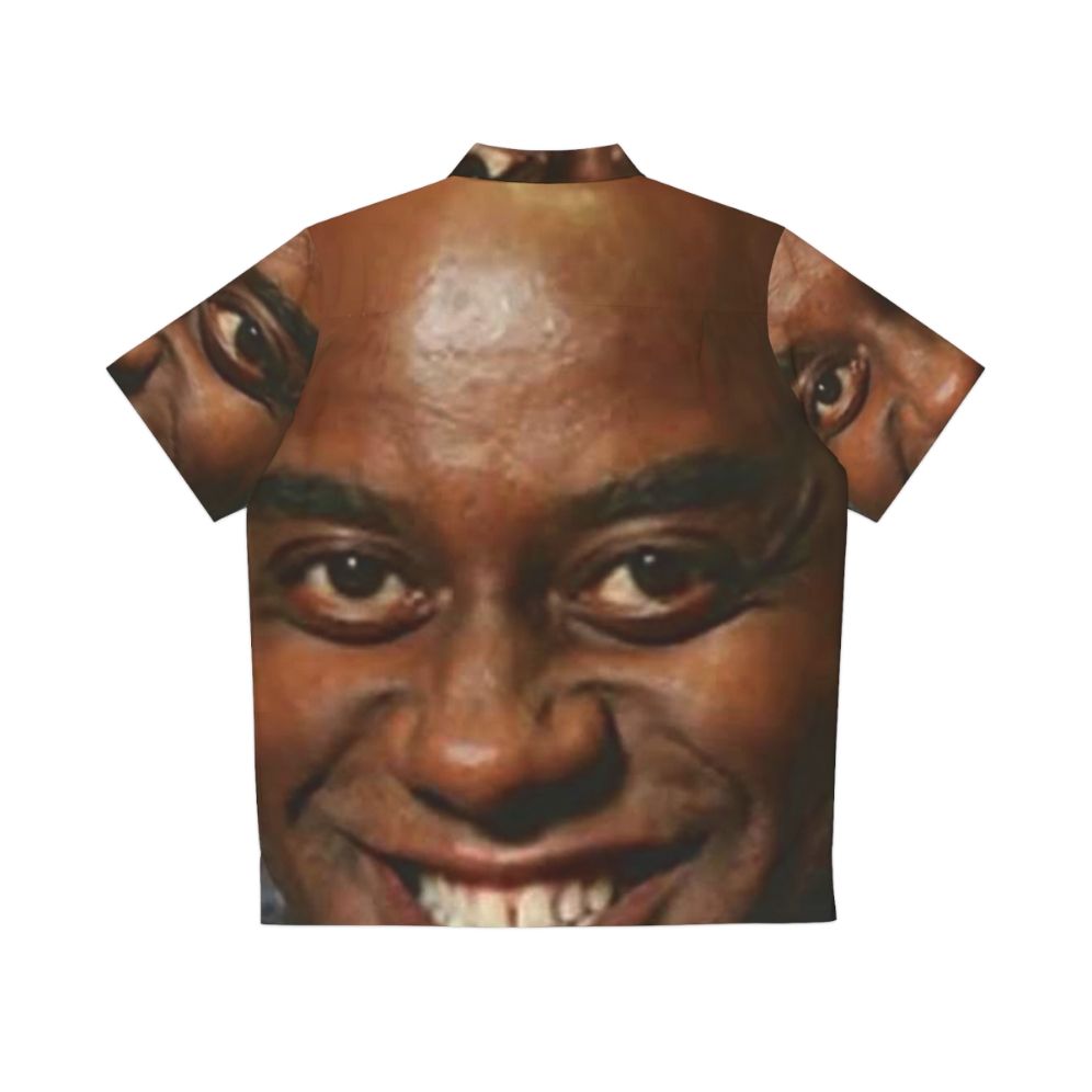 Ainsley Harriott wearing a large, spicy Hawaiian shirt - Back