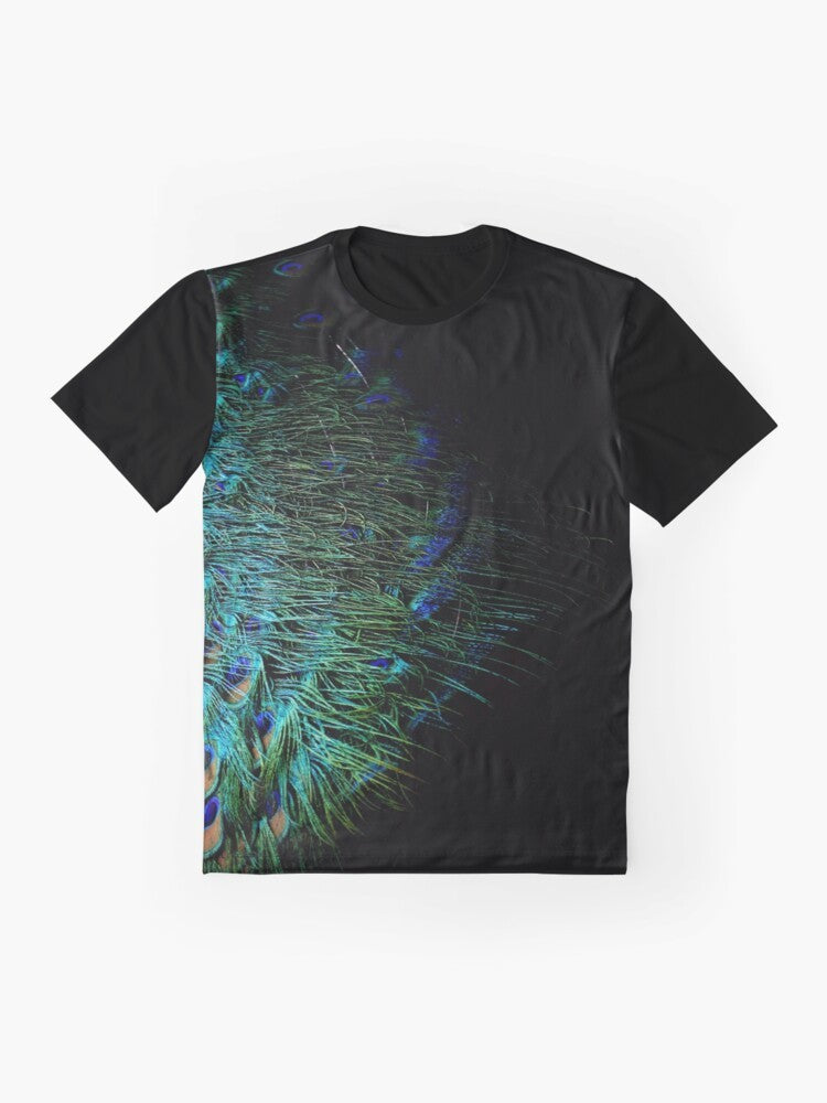 Graphic t-shirt design featuring abstract peacock feathers on a black background, modern aesthetic. - Flat lay