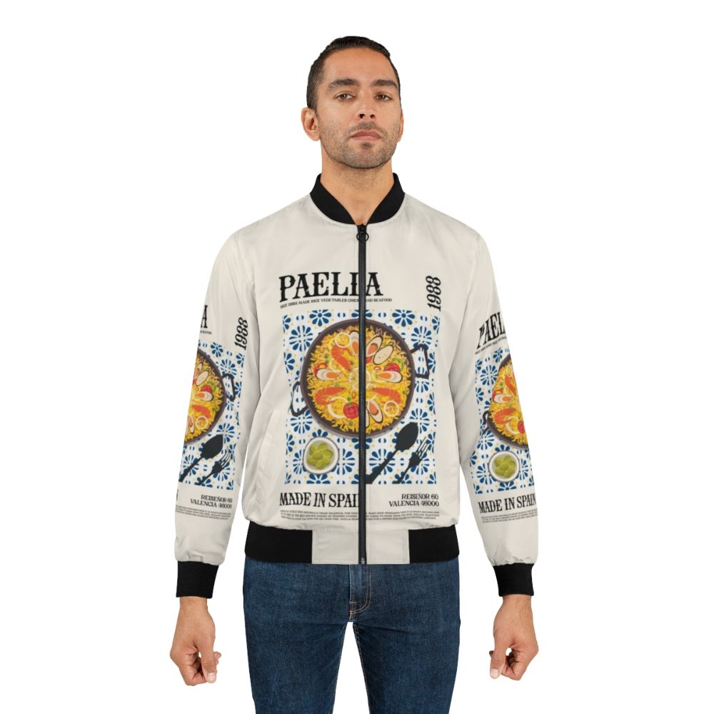 Bomber jacket featuring a vibrant paella-inspired pattern, celebrating the flavors of Spanish cuisine. - Lifestyle