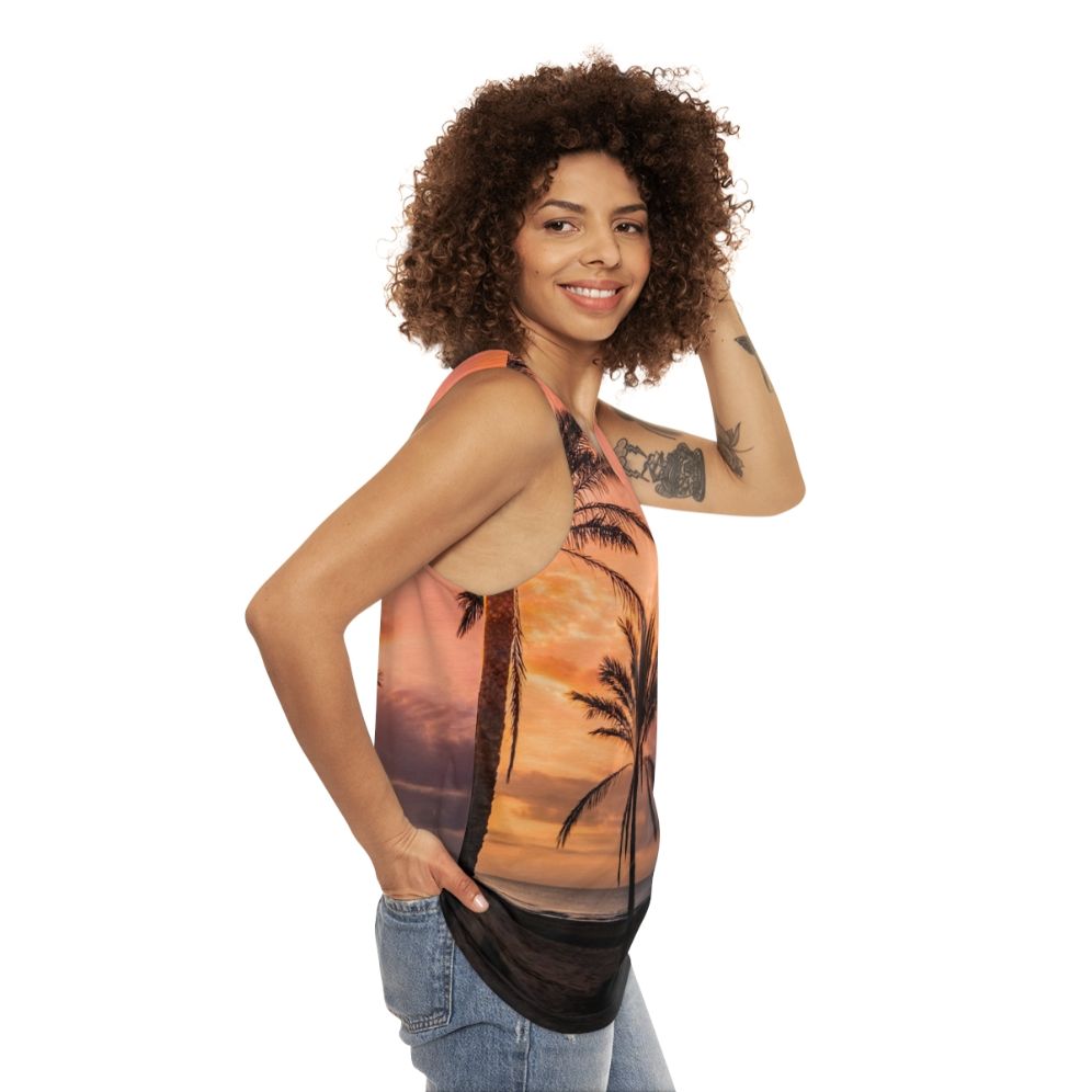 Unisex tank top with a tropical sunrise over palm trees design - women side