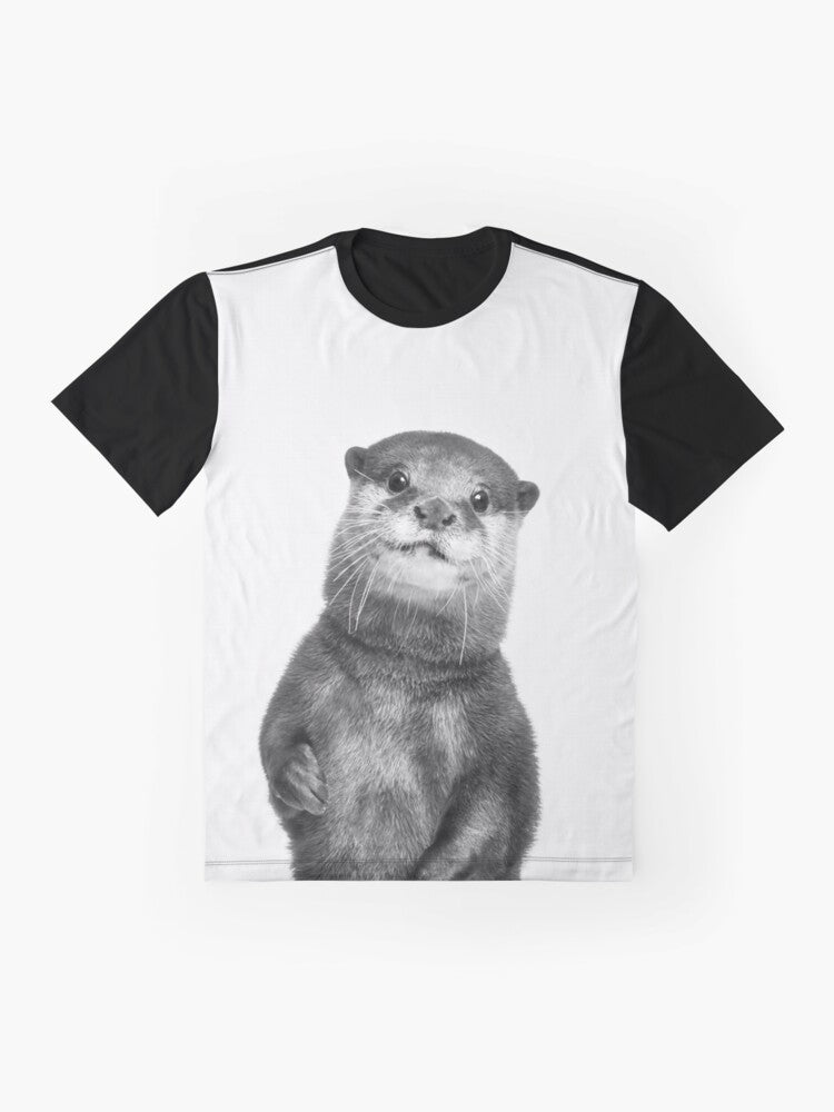 Graphic tee with a cute black and white otter portrait in a nature setting - Flat lay