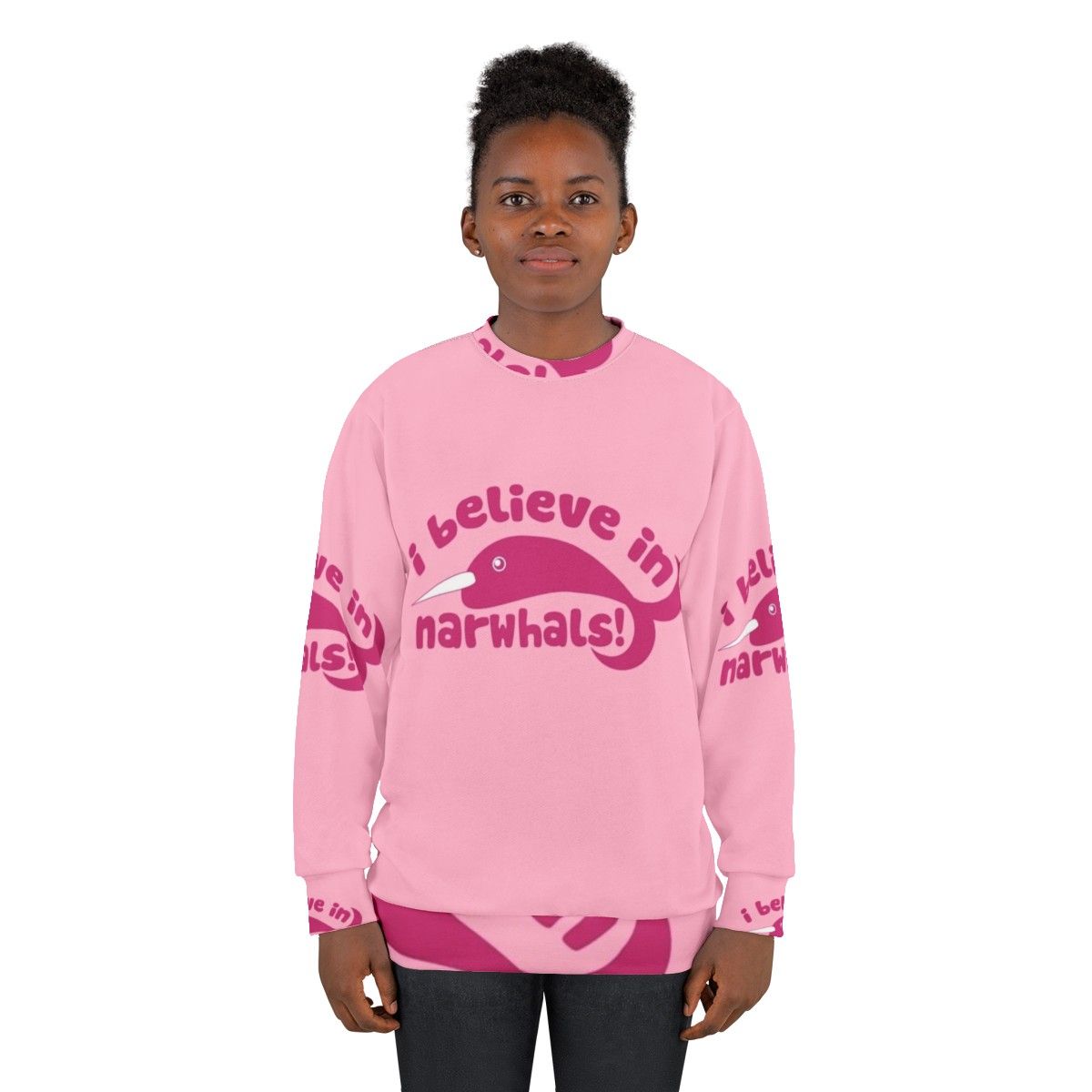 Pink sweatshirt with graphic of a cute narwhal and the text "I Believe in Narwhals" - women