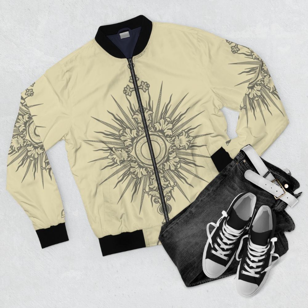 A black and white bomber jacket featuring a minimalist line art design of a monstrance, a Catholic eucharistic symbol. - Flat lay