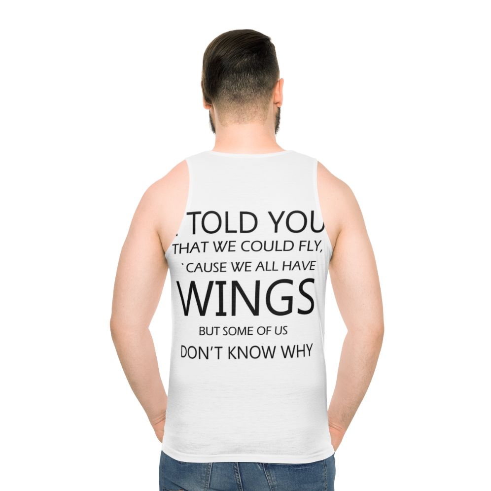 Unisex retro-style tank top with "Never Tear Us Apart" music quote - men back