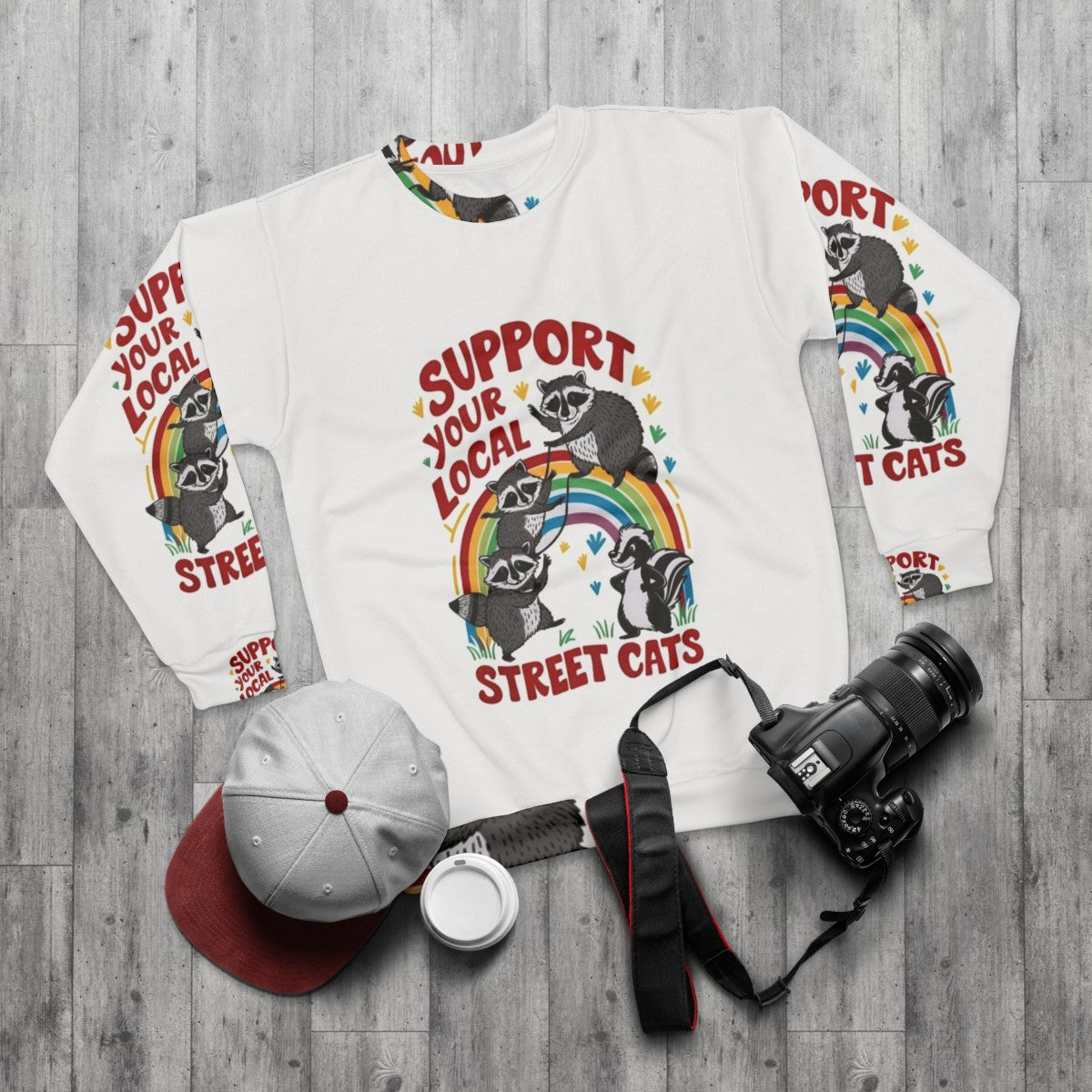 Retro cat sweatshirt with the text "Support Your Local Street Cats" - flat lay