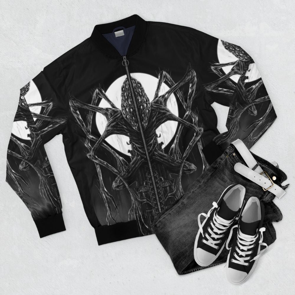 Dark Souls Bloodborne inspired bomber jacket with Lovecraft-inspired monster design - Flat lay