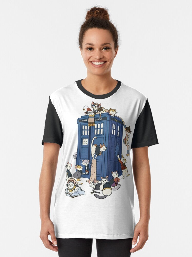 A graphic t-shirt featuring a cartoon cat dressed as the iconic Doctor from the sci-fi TV series Doctor Who. - Women