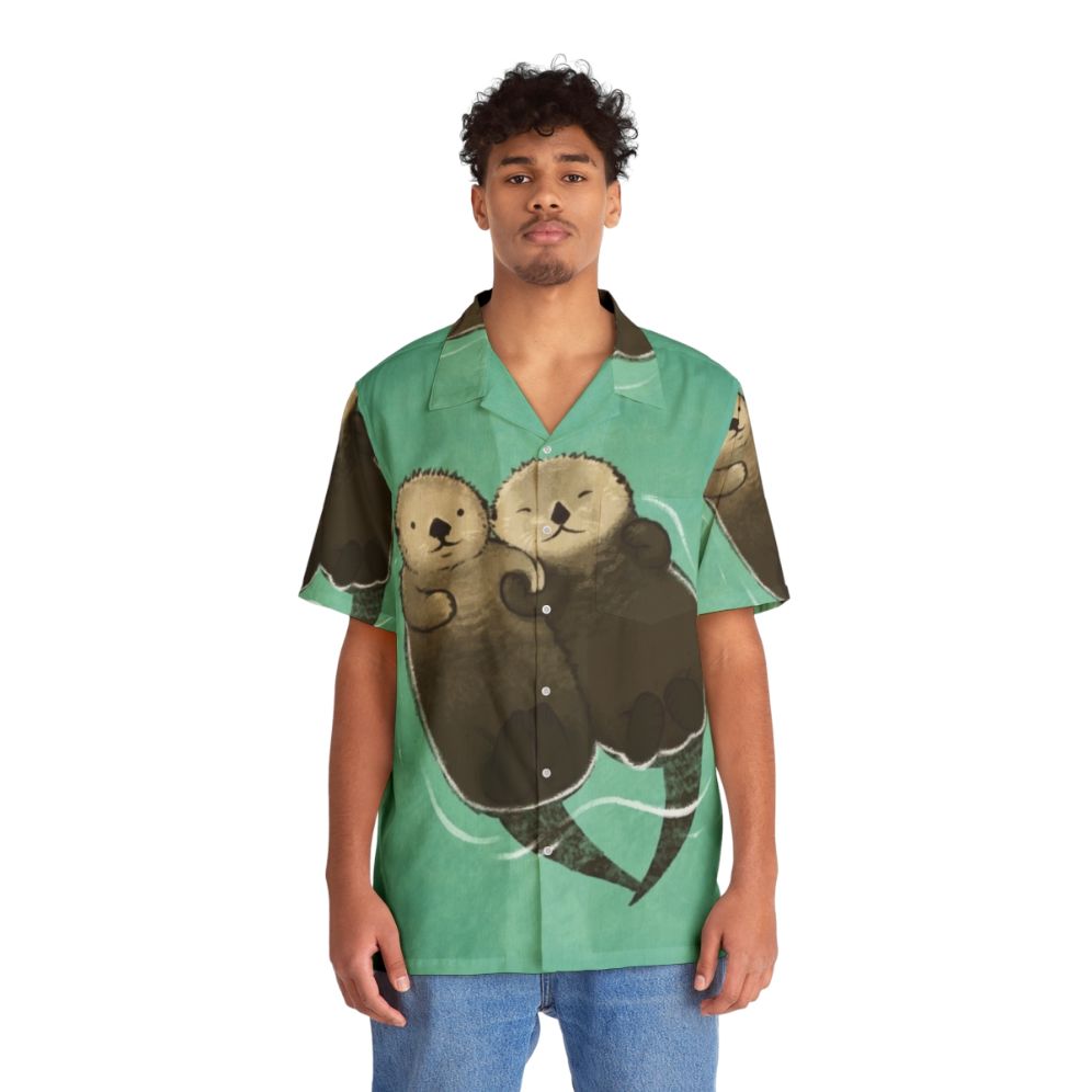 Adorable otters holding hands printed on a vibrant Hawaiian shirt - People Front