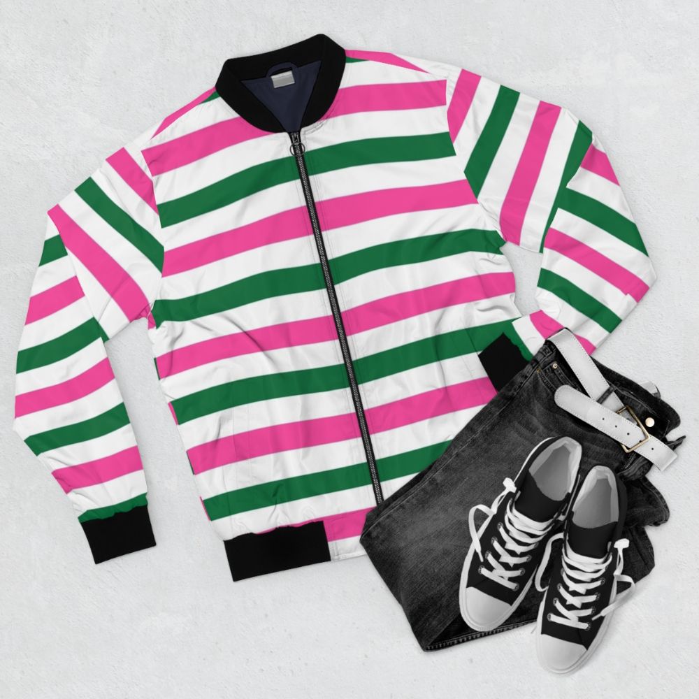 Deckchair-inspired striped bomber jacket in forest green and hot pink - Flat lay