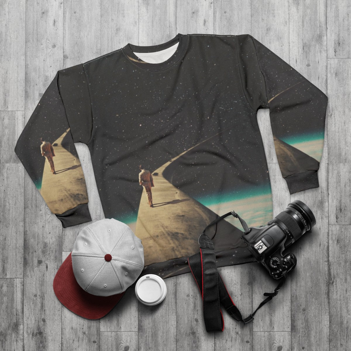 Vintage retro space sweatshirt with surreal graphic design - flat lay