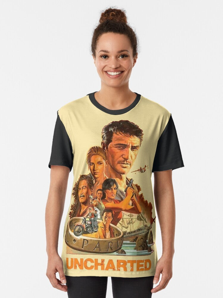 Uncharted video game inspired graphic t-shirt featuring Nathan Drake and the Uncharted logo - Women