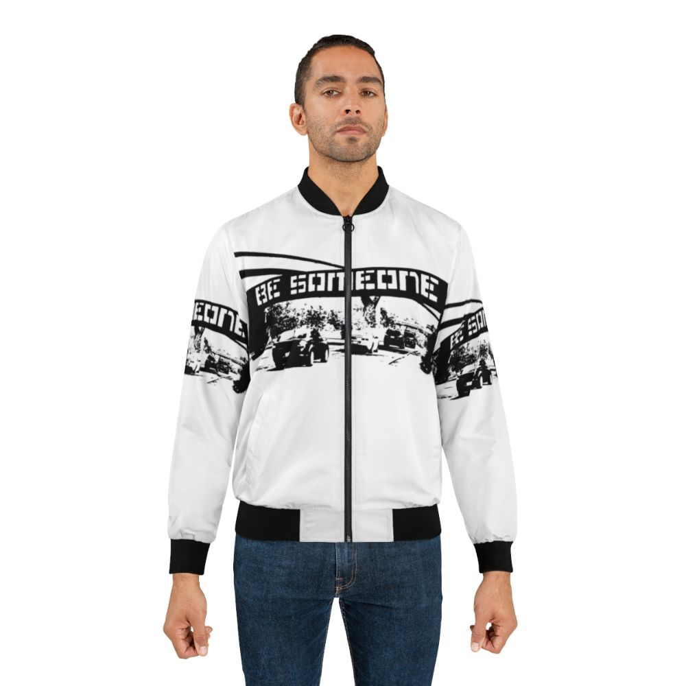 "Be Someone Houston Bomber Jacket featuring graffiti-inspired two-tone design and community-driven graphics" - Lifestyle