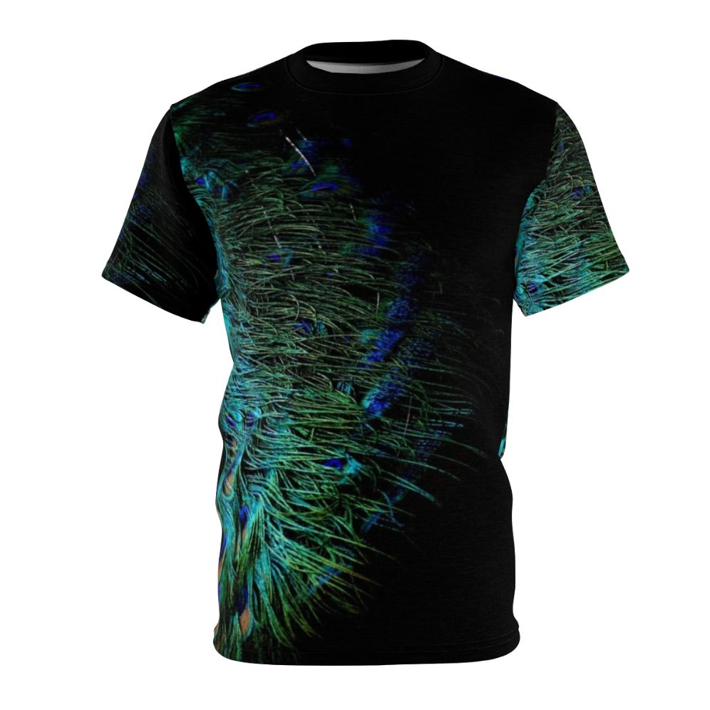 A stylish t-shirt featuring a bold and vibrant peacock feather design against a black background.