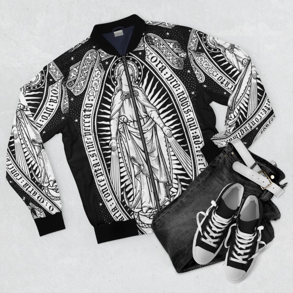 Vintage bomber jacket with engraved image of the Virgin Mary, also known as Our Lady of Guadalupe - Flat lay