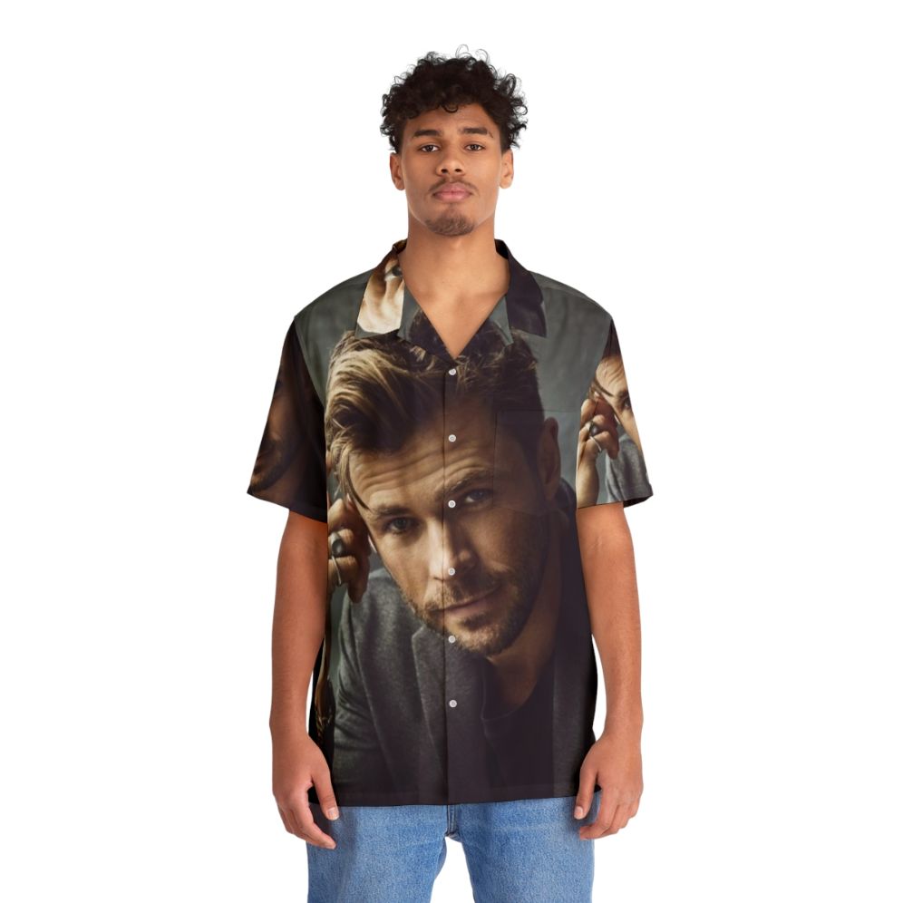 Chris Hemsworth wearing a tropical print Hawaiian shirt - People Front