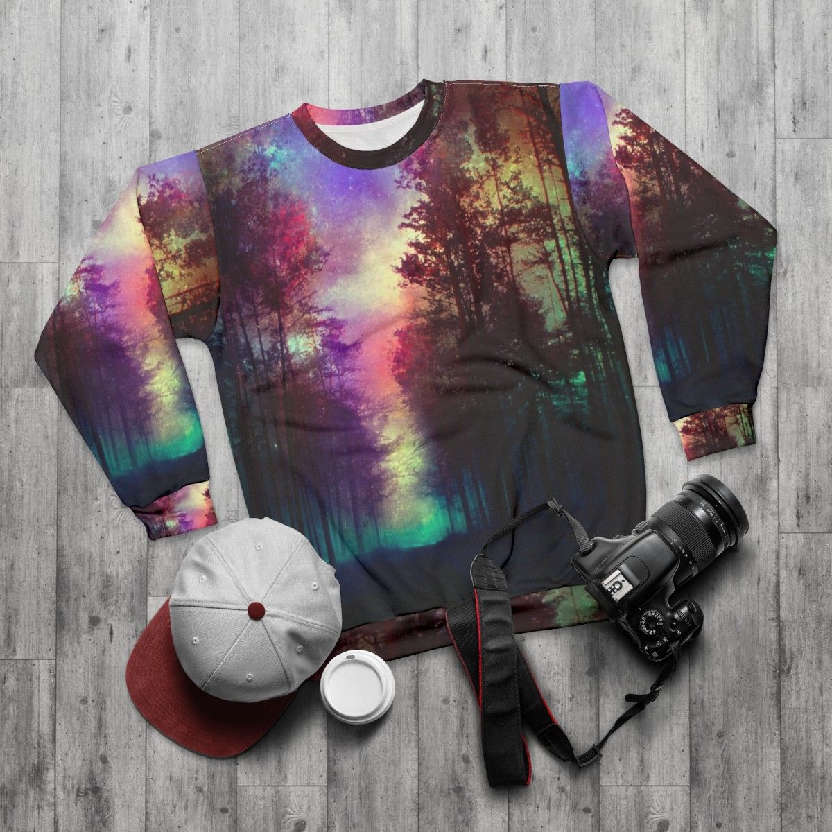 Magical forest sweatshirt featuring a scenic landscape design - flat lay