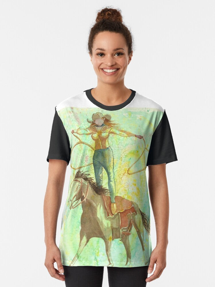 A watercolor-style graphic of a cowgirl trick roping while standing on a horse, with a western art and impressionism design. - Women