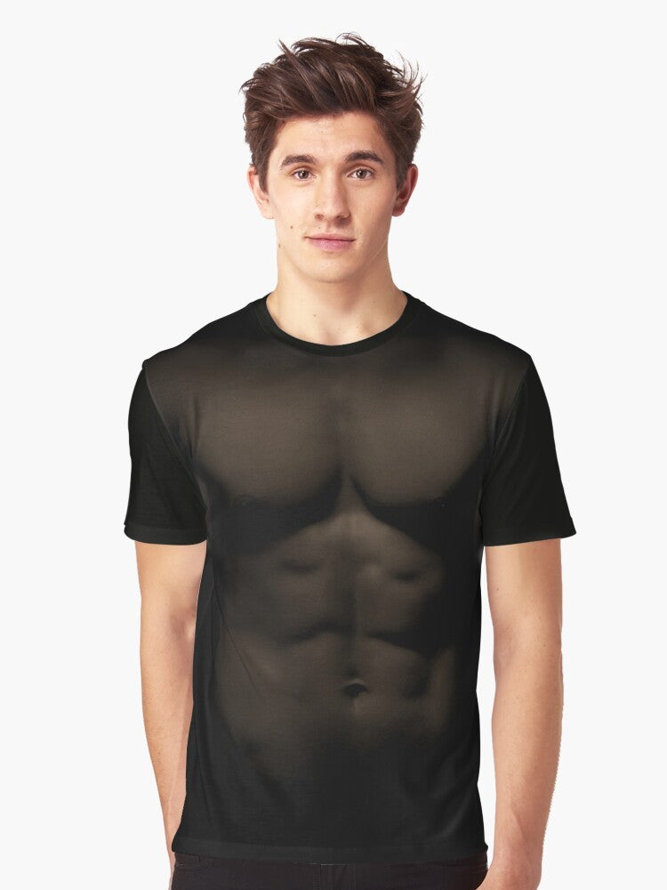 Muscular shirtless man with prominent pectorals and abdominals on a graphic t-shirt - Men