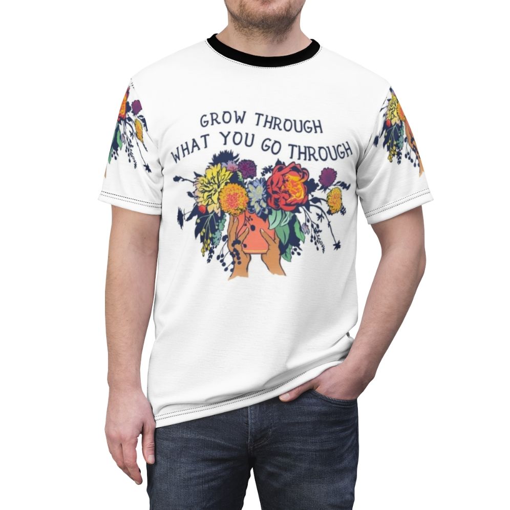 Floral feminist t-shirt with inspirational "Grow Through What You Go Through" message - men front