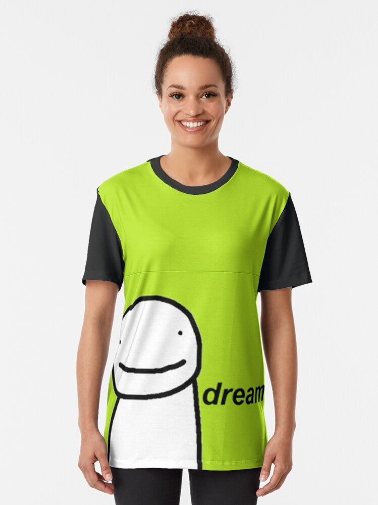 A green and black graphic t-shirt with the word "Dream" and Minecraft elements. - Women