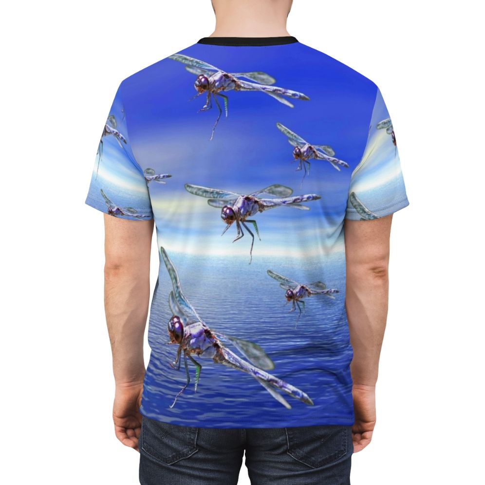 Model wearing a colorful t-shirt with a vibrant dragonfly and abstract pattern design - men back