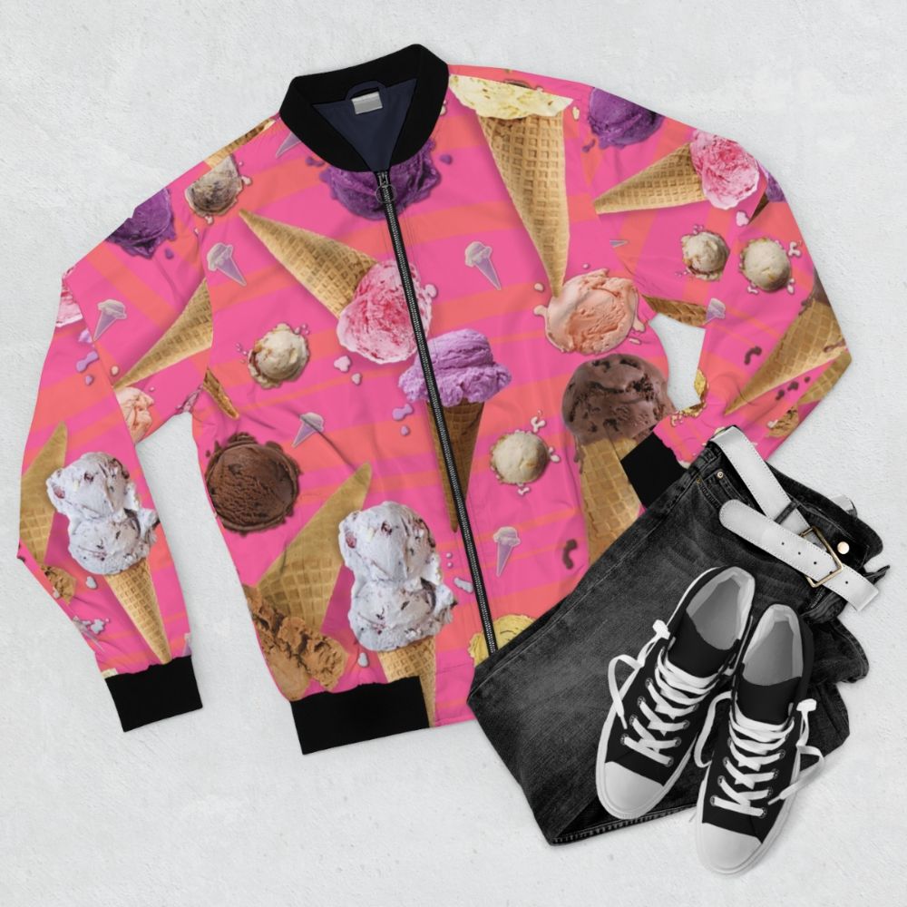 Colorful bomber jacket featuring a digital ice cream design with melting ice cream cones, blobs, and repeating patterns - Flat lay