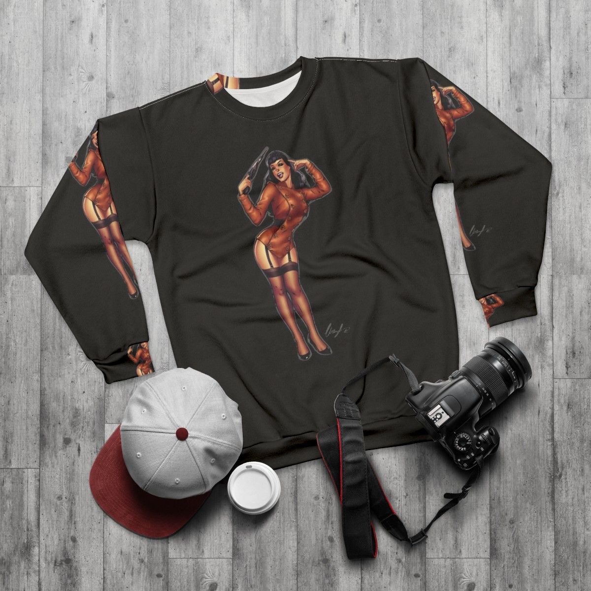 Vintage-inspired Bettie Page sweatshirt with The Rocketeer design - flat lay