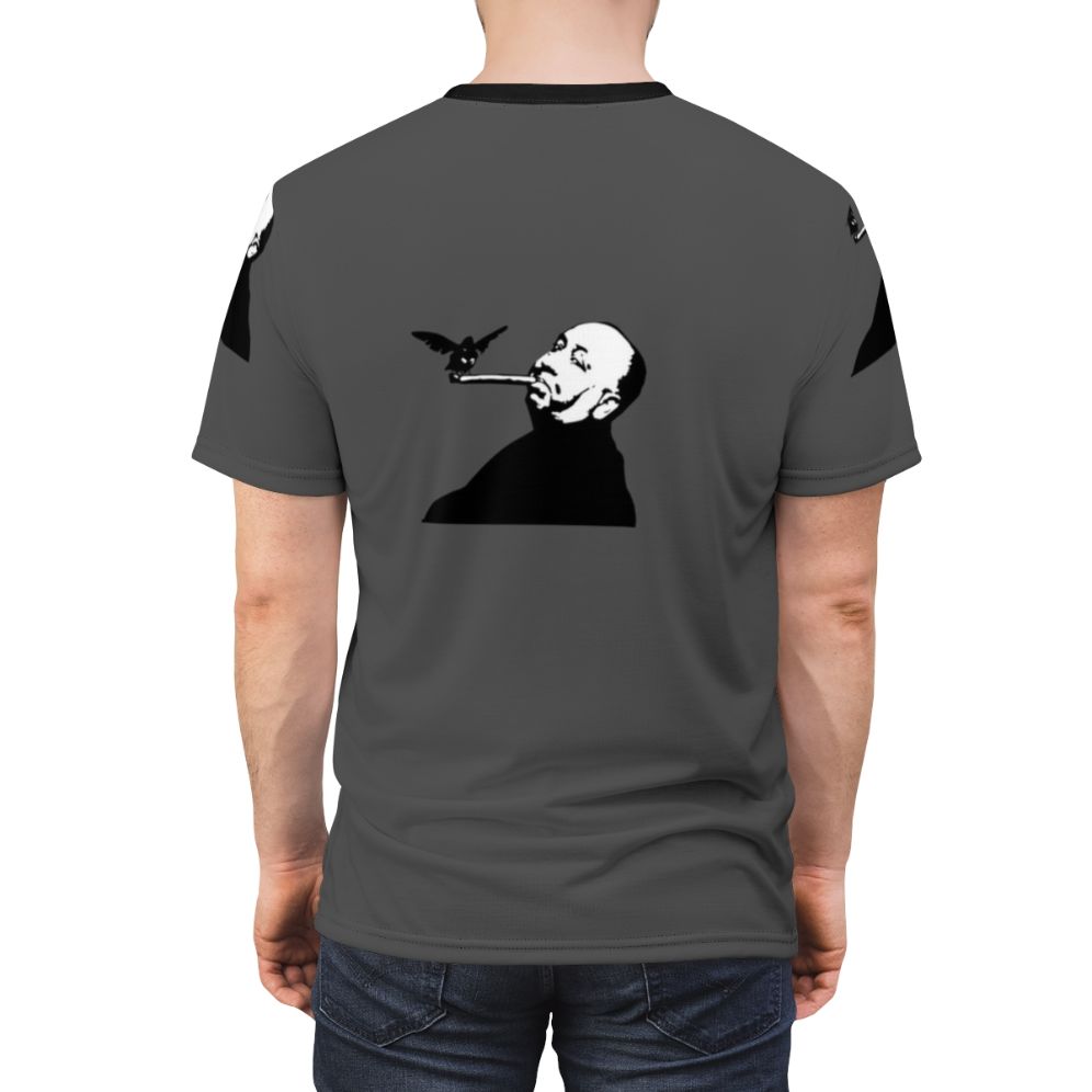 Artistic illustration of birds and a cigar, inspired by the work of Alfred Hitchcock, featured on an AOP t-shirt. - men back