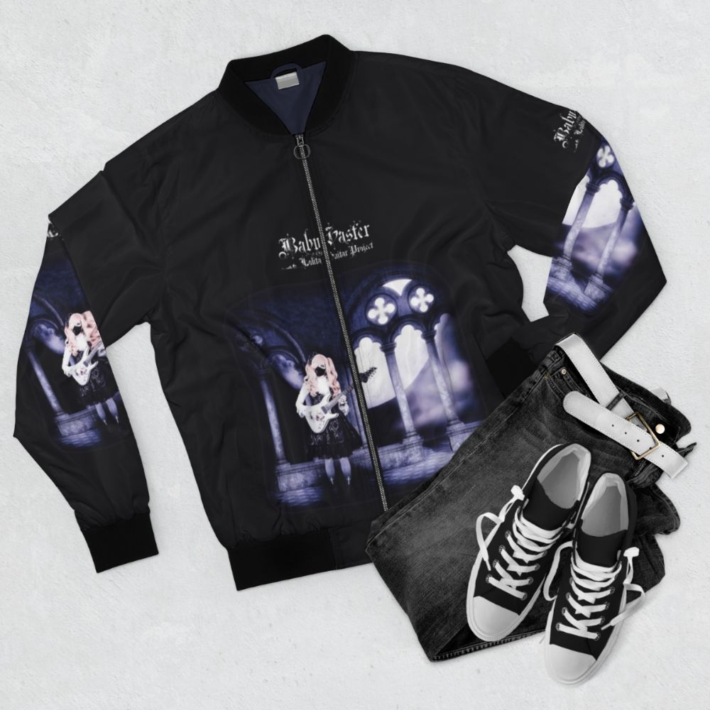 A gothic-style bomber jacket with lolita fashion details, perfect for guitar players and YouTube creators. - Flat lay