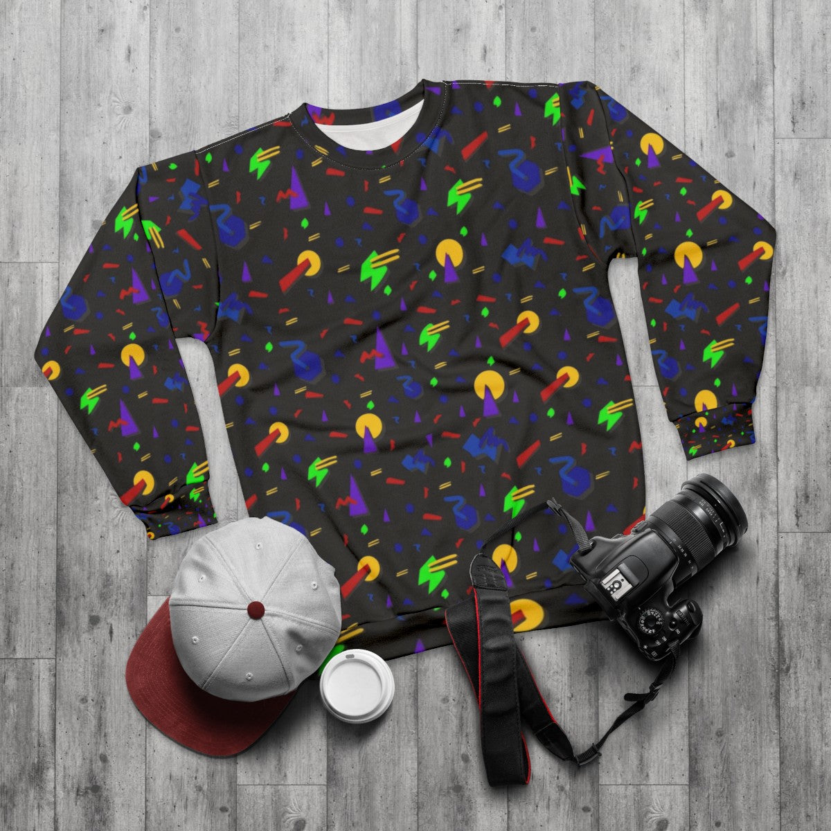 Neon 90s retro sweatshirt with glow-in-the-dark patterns - flat lay