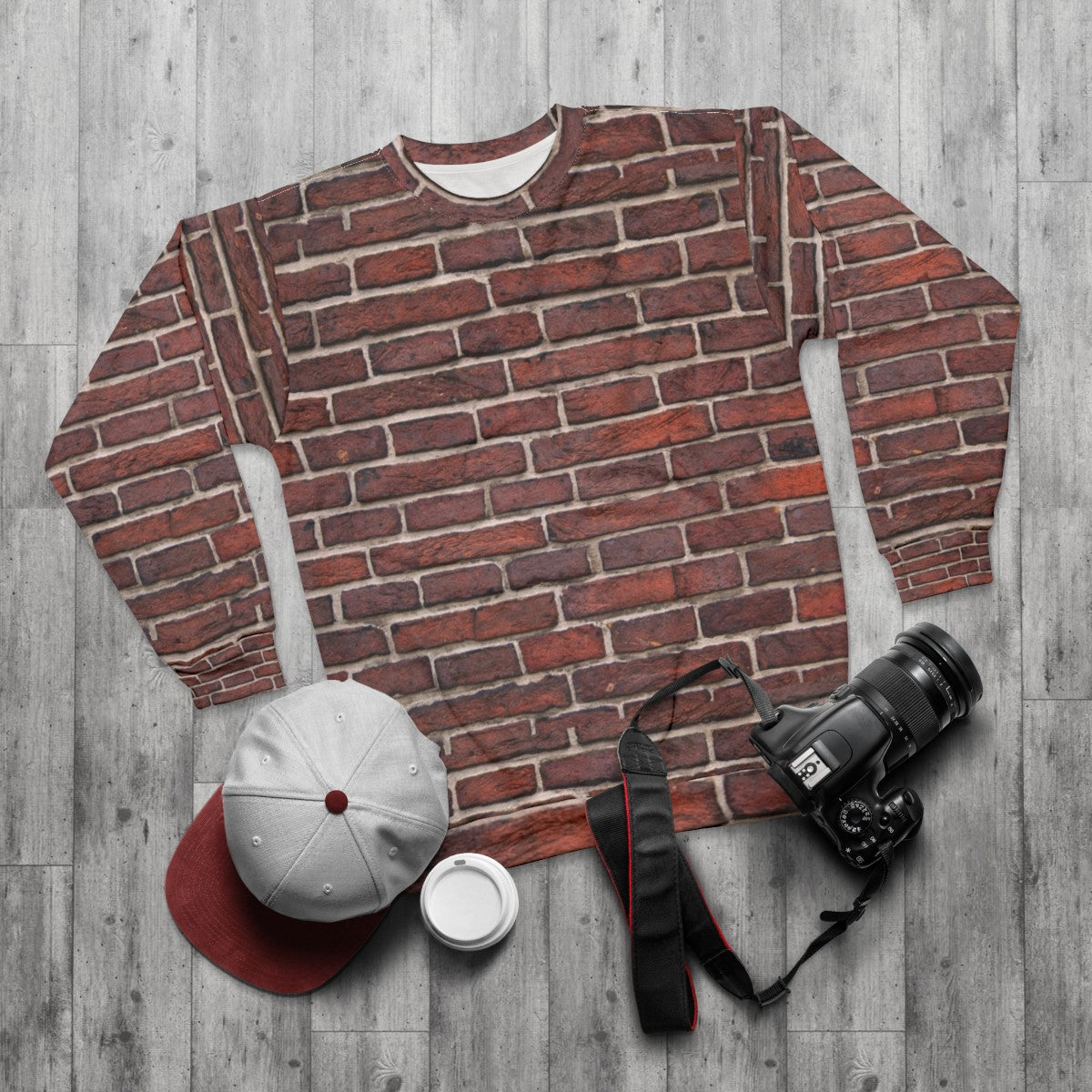 Red brick wall pattern design on sweatshirt - flat lay